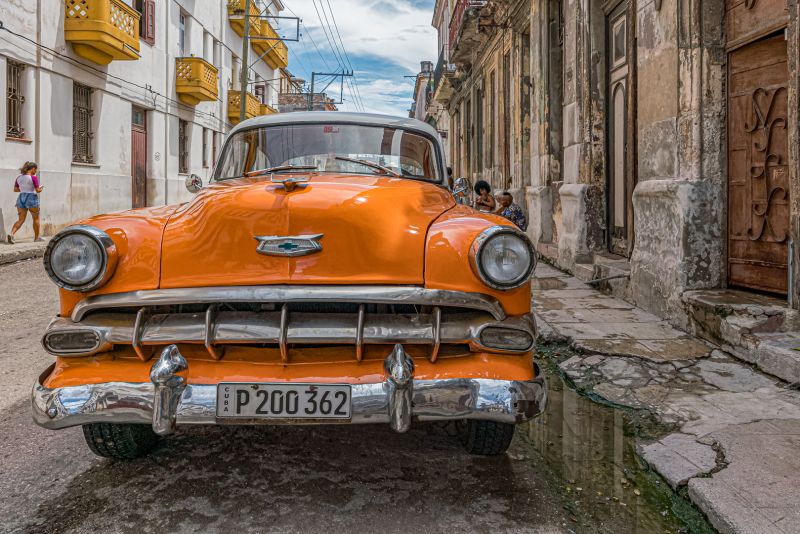 Vicki Moritz Cuba orange car